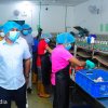 Observing the "Happy Cook" canned fish factory in Galle